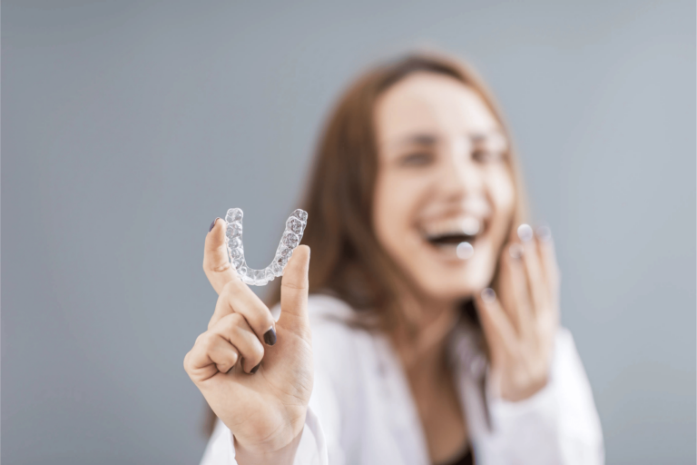 Girl Dentist Smiling with Invisalign